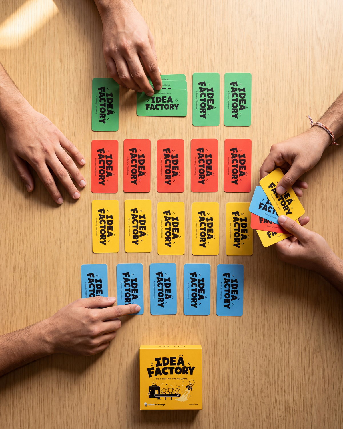 Dozens of Idea Factory cards laid out for a Factory Mode run